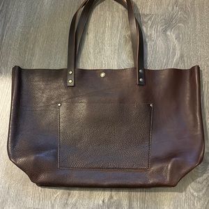 Pre-loved gentle used condition. Portland leather goods oversized.